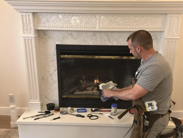 Brandon Chimney Sweep performing fireplace maintenance in Brandon, FL